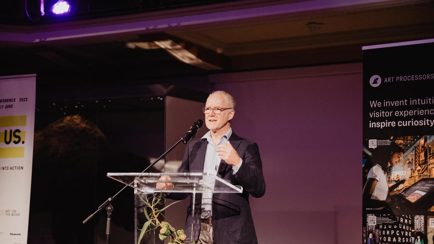 Mark Nihill presenting on stage